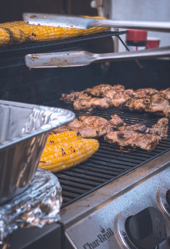Pellet grill accessories cooking chicken and corn on grill